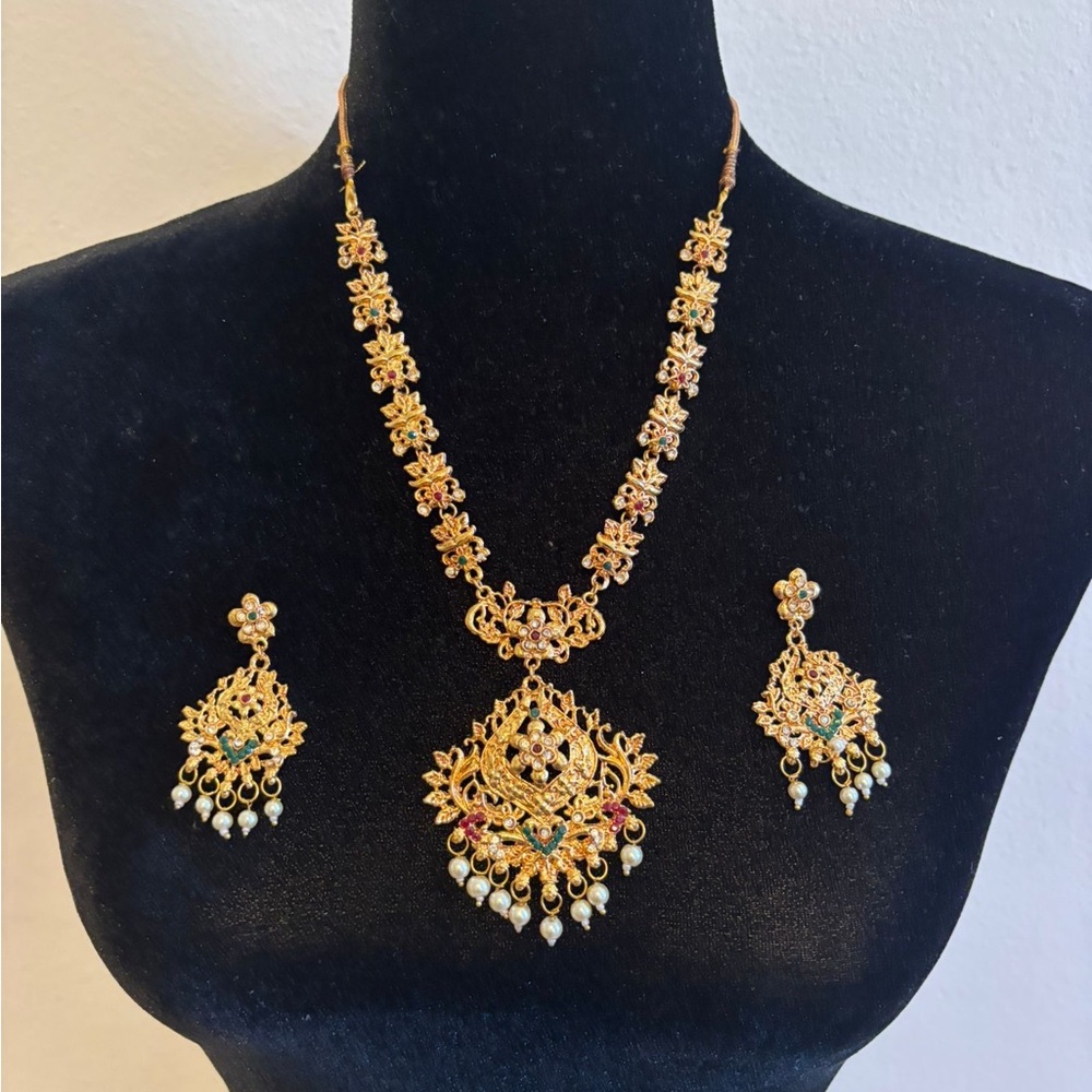 Intricate Gold Necklace and Earring Set